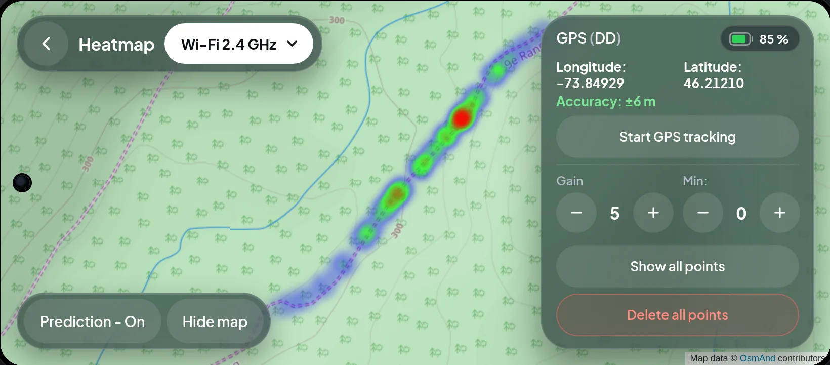 Passive heatmap: signal strength painted along a forest road on the map, strongest in red